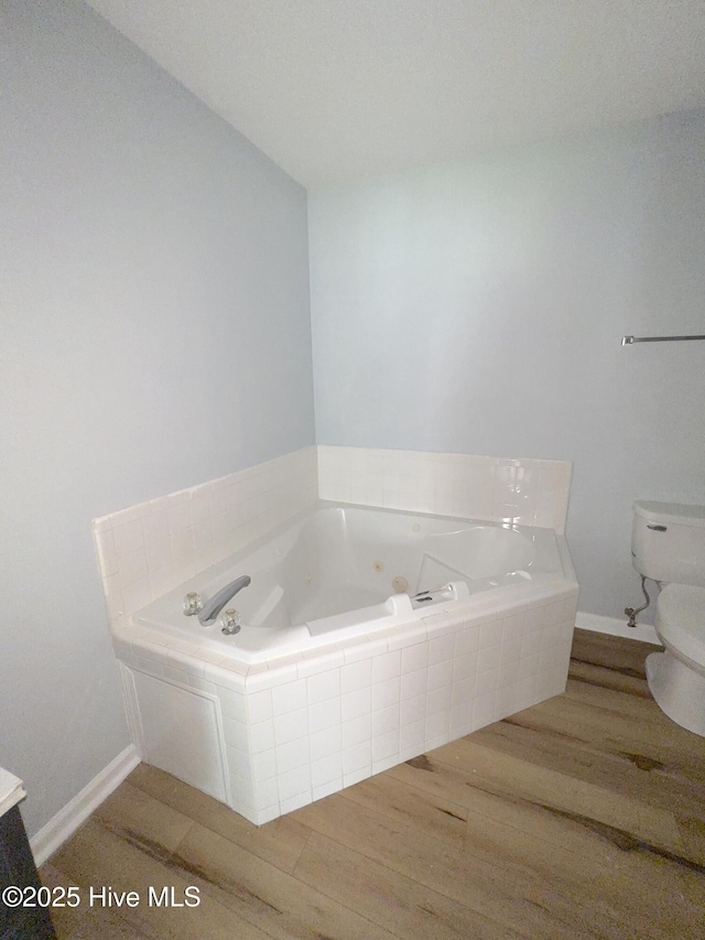 2940 Mulberry Ln Unit B, Greenville, NC 27858 - full bathroom with wood finished floors and a whirlpool tub