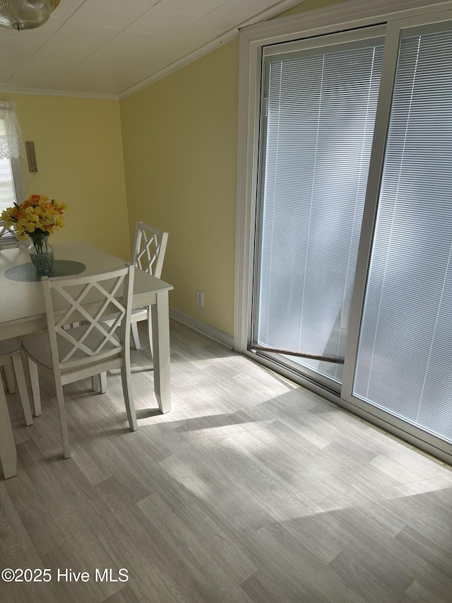 410 Brown Dr, New Bern, NC 28560 - dining room featuring wood finished floors and crown molding