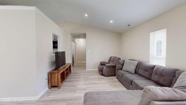 973 Ramsey Rd, Jacksonville, NC 28546 - living room with light wood finished floors, lofted ceiling, and recessed lighting