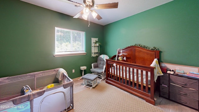 973 Ramsey Rd, Jacksonville, NC 28546 - bedroom featuring a nursery area and ceiling fan