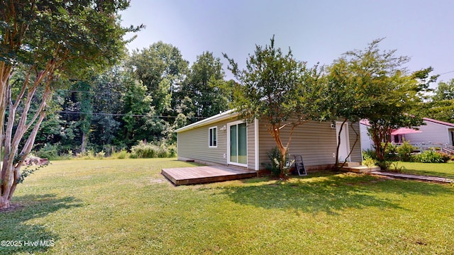 973 Ramsey Rd, Jacksonville, NC 28546 - view of grassy yard featuring a deck
