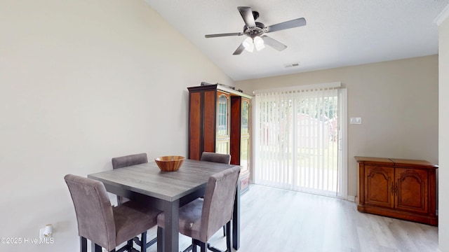 973 Ramsey Rd, Jacksonville, NC 28546 - dining area with light wood-type flooring, vaulted ceiling, and a ceiling fan