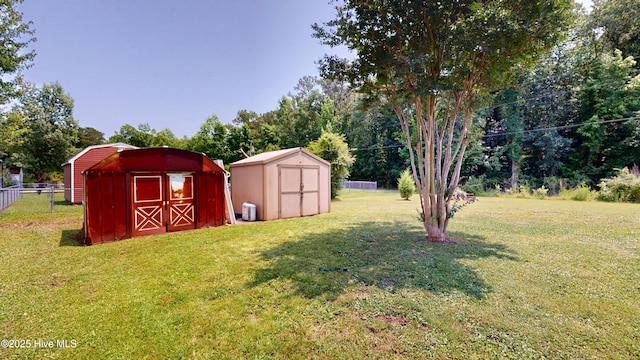 973 Ramsey Rd, Jacksonville, NC 28546 - view of yard with a shed and view of wooded area