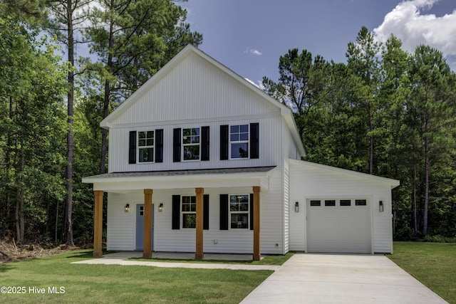1536 Dorsey Ln, Navassa, NC 28451 - modern farmhouse style home with an attached garage, covered porch, driveway, and a front lawn