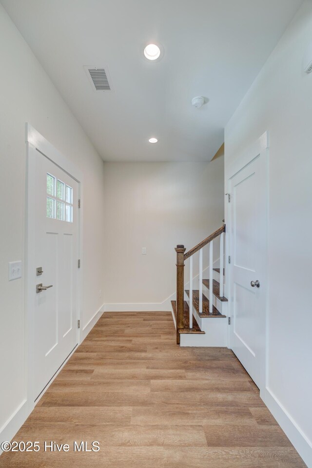 1536 Dorsey Ln, Navassa, NC 28451 - foyer entrance with stairs, recessed lighting, and light wood-style flooring