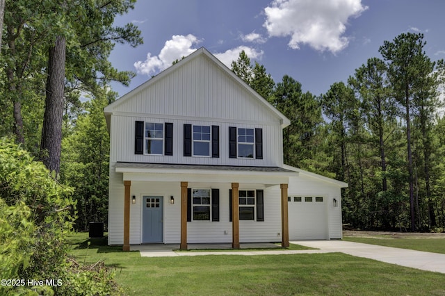 1536 Dorsey Ln, Navassa, NC 28451 - modern farmhouse featuring covered porch, a front yard, concrete driveway, and an attached garage