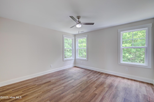 1536 Dorsey Ln, Navassa, NC 28451 - spare room featuring light wood-style flooring and a ceiling fan