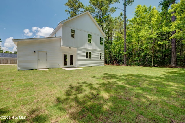 1536 Dorsey Ln, Navassa, NC 28451 - back of property featuring french doors and a lawn