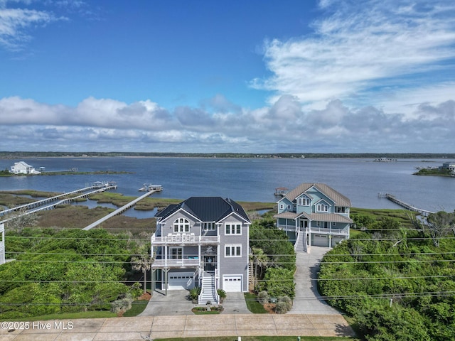 611 New River Inlet Rd, North Topsail Beach, NC 28460 - aerial view of property and surrounding area with a nearby body of water