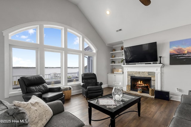 611 New River Inlet Rd, North Topsail Beach, NC 28460 - living area featuring high vaulted ceiling, a fireplace, dark wood-type flooring, and recessed lighting
