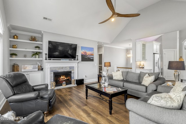 611 New River Inlet Rd, North Topsail Beach, NC 28460 - living area featuring a ceiling fan, dark wood finished floors, high vaulted ceiling, and a fireplace