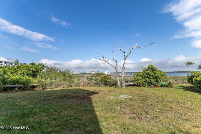 611 New River Inlet Rd, North Topsail Beach, NC 28460 - view of green lawn featuring a water view
