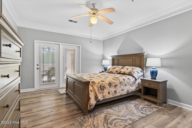280 Woodlands Way Unit 5, Calabash, NC 28467 - bedroom with access to exterior, light wood-style flooring, crown molding, and a ceiling fan