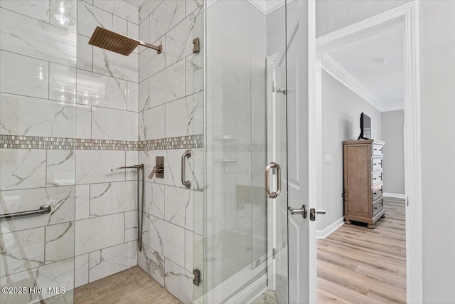 280 Woodlands Way Unit 5, Calabash, NC 28467 - bathroom with ornamental molding, a shower stall, and wood finished floors