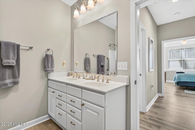 280 Woodlands Way Unit 5, Calabash, NC 28467 - bathroom featuring double vanity, wood finished floors, and ensuite bath