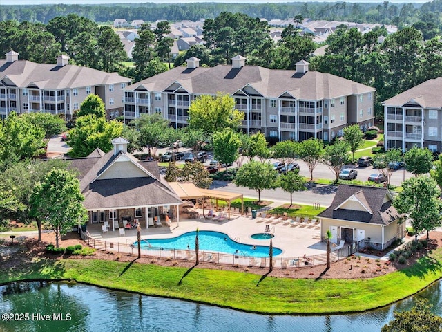 280 Woodlands Way Unit 5, Calabash, NC 28467 - drone / aerial view of a pool area and a large body of water