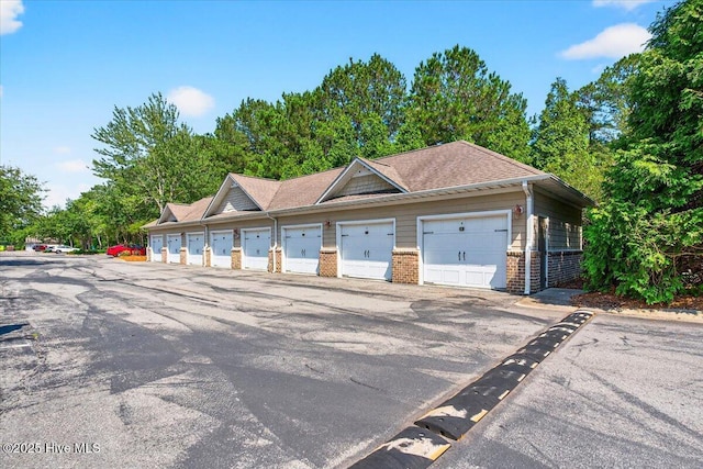 280 Woodlands Way Unit 5, Calabash, NC 28467 - view of front of property featuring community garages and brick siding