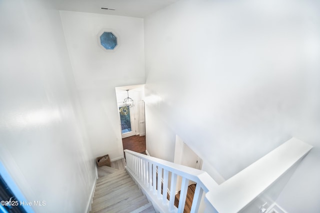 6017 Covenant Ln, Wilmington, NC 28403 - staircase with wood finished floors and baseboards