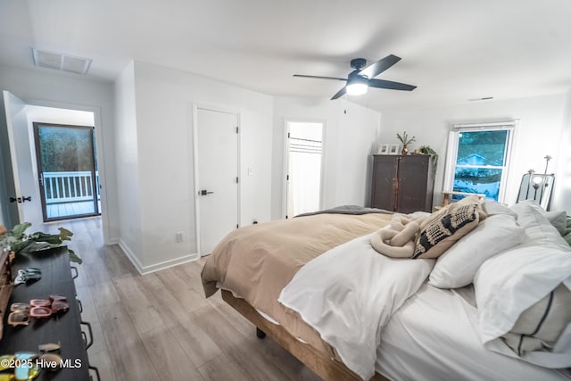 6017 Covenant Ln, Wilmington, NC 28403 - bedroom with light wood-style flooring and a ceiling fan