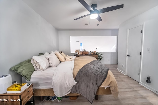 6017 Covenant Ln, Wilmington, NC 28403 - bedroom featuring a ceiling fan and light wood finished floors