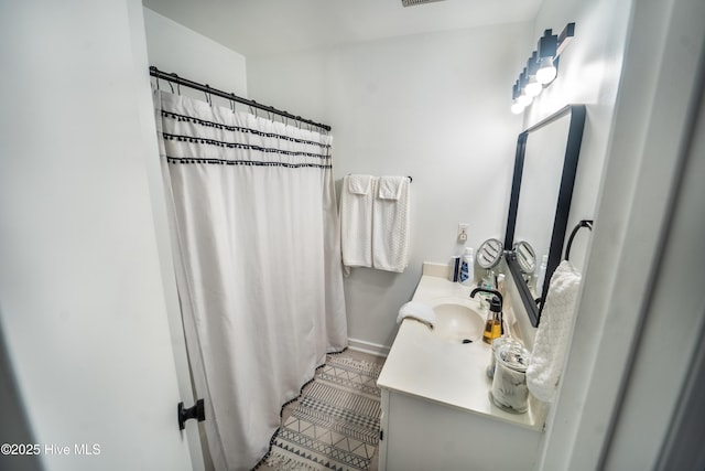 6017 Covenant Ln, Wilmington, NC 28403 - bathroom with vanity, tile patterned floors, and a shower with curtain