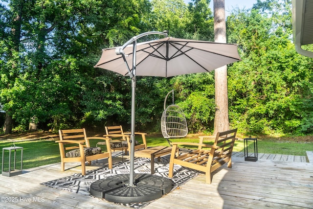 6017 Covenant Ln, Wilmington, NC 28403 - wooden terrace with view of wooded area and a yard