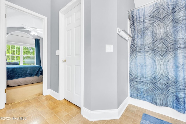529 Maple Branches Dr, Leland, NC 28451 - ensuite bathroom featuring ceiling fan and curtained shower