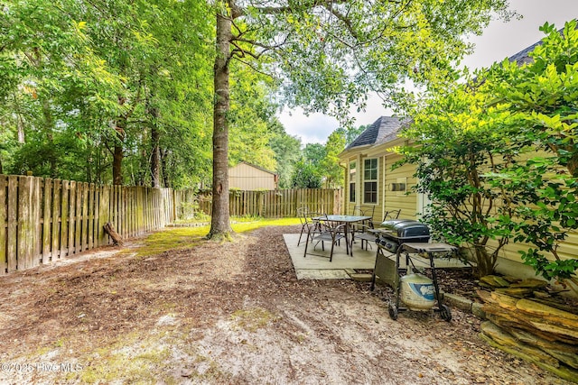 529 Maple Branches Dr, Leland, NC 28451 - fenced backyard with a patio area
