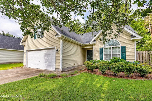 529 Maple Branches Dr, Leland, NC 28451 - view of front of home featuring a garage, concrete driveway, and roof with shingles