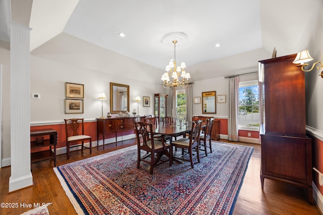 2000 Marsh Harbor Pl, Wilmington, NC 28405 - dining space with lofted ceiling, a chandelier, wood finished floors, recessed lighting, and decorative columns