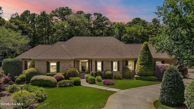 2000 Marsh Harbor Pl, Wilmington, NC 28405 - view of front of property with a lawn and brick siding