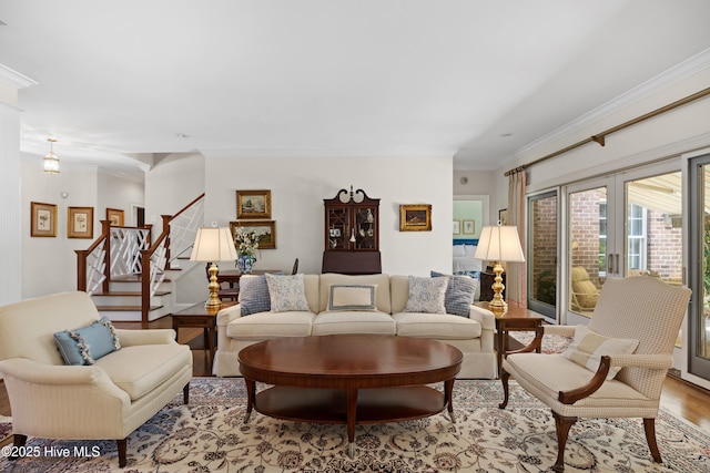 2000 Marsh Harbor Pl, Wilmington, NC 28405 - living room featuring wood finished floors, stairway, and ornamental molding