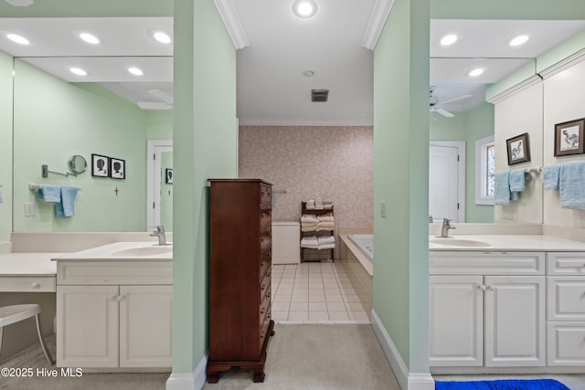 2000 Marsh Harbor Pl, Wilmington, NC 28405 - full bath with a ceiling fan, wallpapered walls, two vanities, a bath, and recessed lighting
