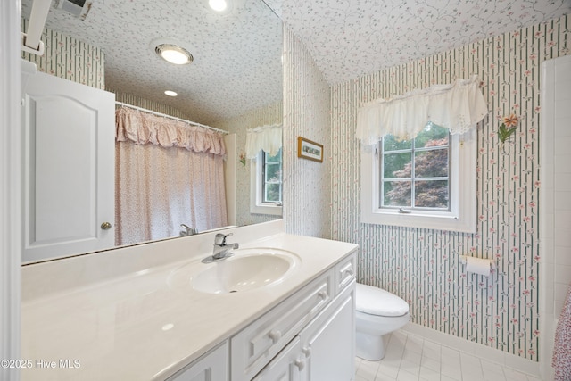 2000 Marsh Harbor Pl, Wilmington, NC 28405 - full bath featuring wallpapered walls, vanity, tile patterned floors, and a shower with shower curtain