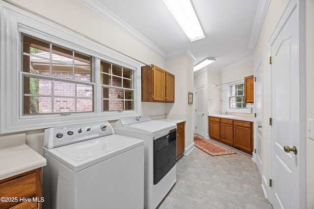 2000 Marsh Harbor Pl, Wilmington, NC 28405 - laundry room with cabinet space, independent washer and dryer, and crown molding