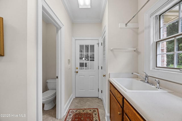 2000 Marsh Harbor Pl, Wilmington, NC 28405 - bathroom with ornamental molding, vanity, and tile patterned flooring