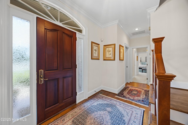 2000 Marsh Harbor Pl, Wilmington, NC 28405 - entrance foyer with wood finished floors, crown molding, and recessed lighting