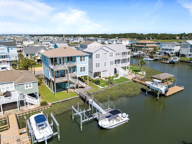 130 Raleigh St, Holden Beach, NC 28462 - aerial view of residential area featuring a large body of water