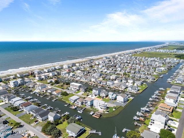 130 Raleigh St, Holden Beach, NC 28462 - aerial view of property and surrounding area featuring a large body of water