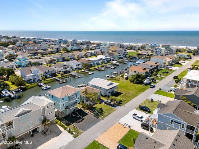 130 Raleigh St, Holden Beach, NC 28462 - aerial view of residential area with a large body of water