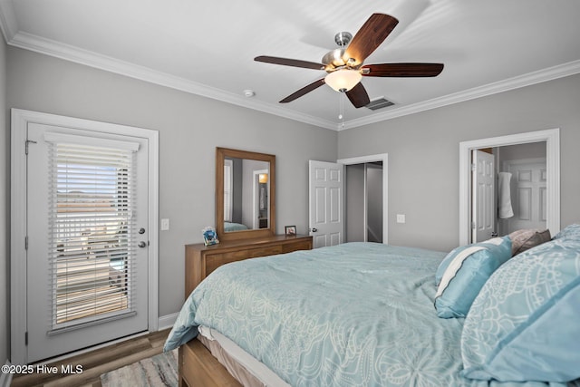 130 Raleigh St, Holden Beach, NC 28462 - bedroom featuring ornamental molding, wood finished floors, access to outside, and a ceiling fan