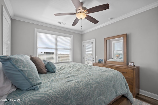 130 Raleigh St, Holden Beach, NC 28462 - bedroom featuring wood finished floors, crown molding, and ceiling fan