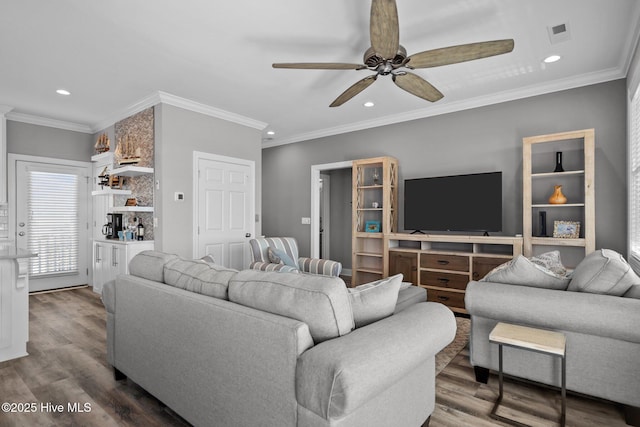 130 Raleigh St, Holden Beach, NC 28462 - living area with ceiling fan, recessed lighting, wood finished floors, ornamental molding, and bar