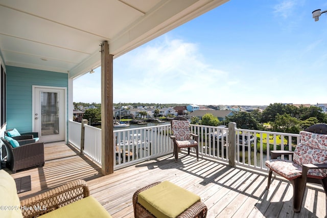 130 Raleigh St, Holden Beach, NC 28462 - wooden terrace with a water view