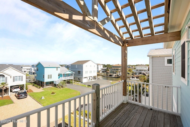 130 Raleigh St, Holden Beach, NC 28462 - balcony featuring a residential view, a water view, and a pergola