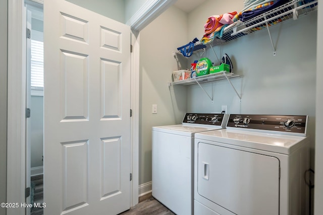 130 Raleigh St, Holden Beach, NC 28462 - laundry room featuring independent washer and dryer and wood finished floors