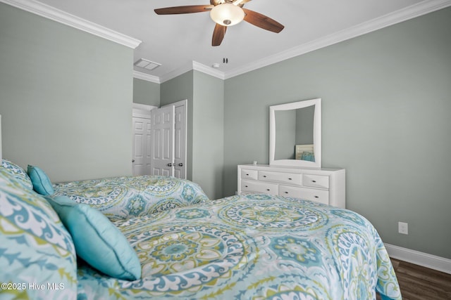 130 Raleigh St, Holden Beach, NC 28462 - bedroom featuring ornamental molding, wood finished floors, and ceiling fan