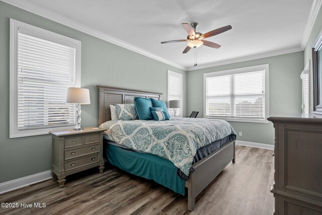 130 Raleigh St, Holden Beach, NC 28462 - bedroom featuring wood finished floors, crown molding, and ceiling fan