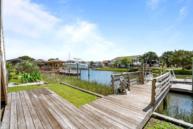 130 Raleigh St, Holden Beach, NC 28462 - dock area featuring a water view
