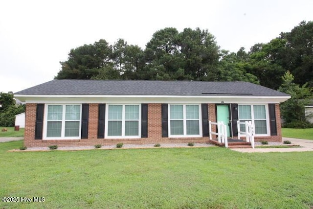 121 Walter Dr, Battleboro, NC 27809 - ranch-style house with brick siding and a front lawn